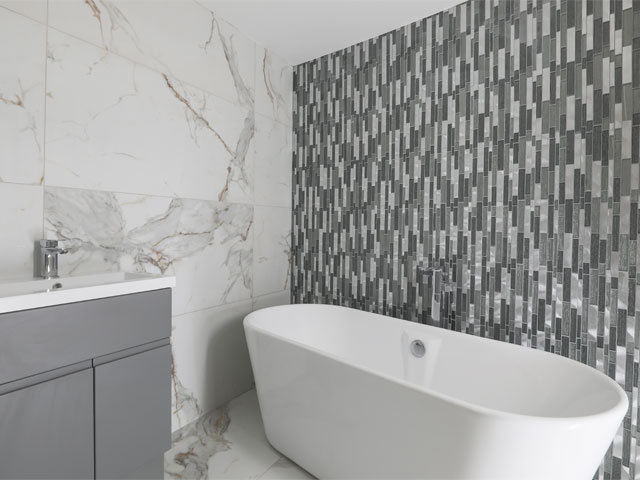 Modern contemporary marble wall bathroom large bathtub grey tiles