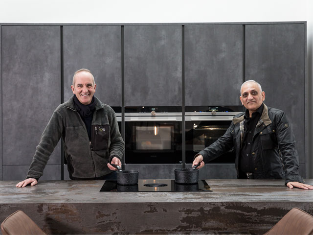 Kevin McCloud Jatinder grey contemporary kitchen triple oven saucepans