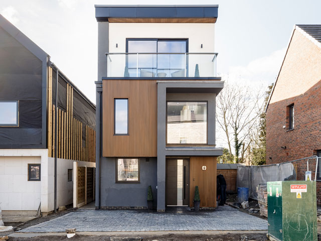 Grand Designs The Streets three storey home with rendering and balcony