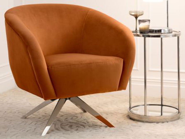 large orange furniture with metallic legs metal and glass side table white carpet