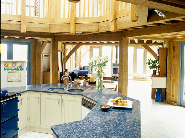 Oak framed home kitchen blue work surfaces blue aga oven