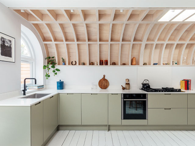 Renovate for less.bright kitchen curved timber roof light green kitchen cabinets white walls