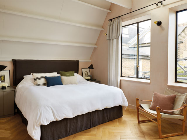 Building Regulation. light coloured herringbone floor bed white duvet loft bedroom grey curtains