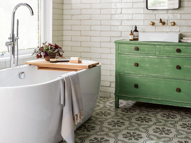 White tiles green drawer sink unit white freestanding bath wooden bath shelf red plant 