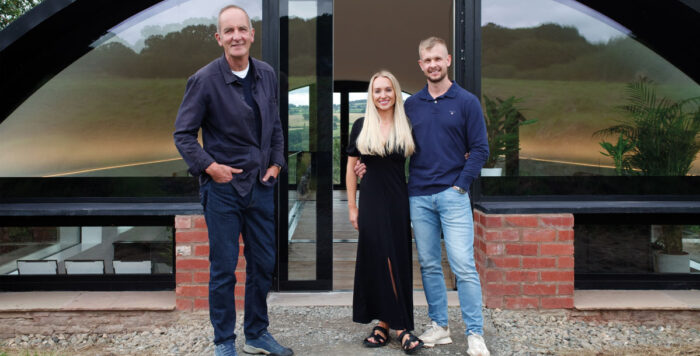 Kevin McCloud stands in front of a Grand Designs build