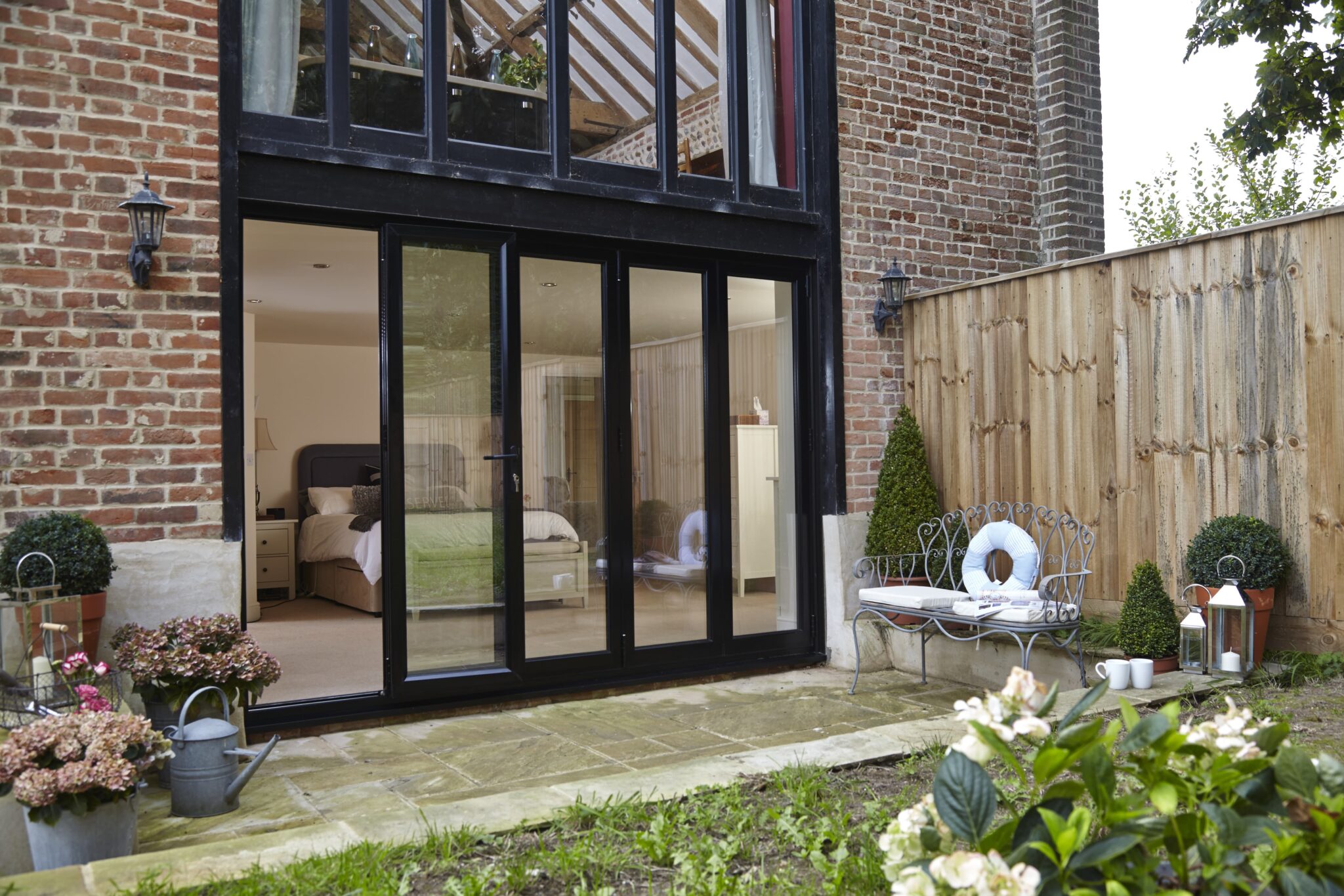 Byfold Doors With Magazine Rack Ultimate bifold doors guide - styles, types, and pros and cons - Grand ...