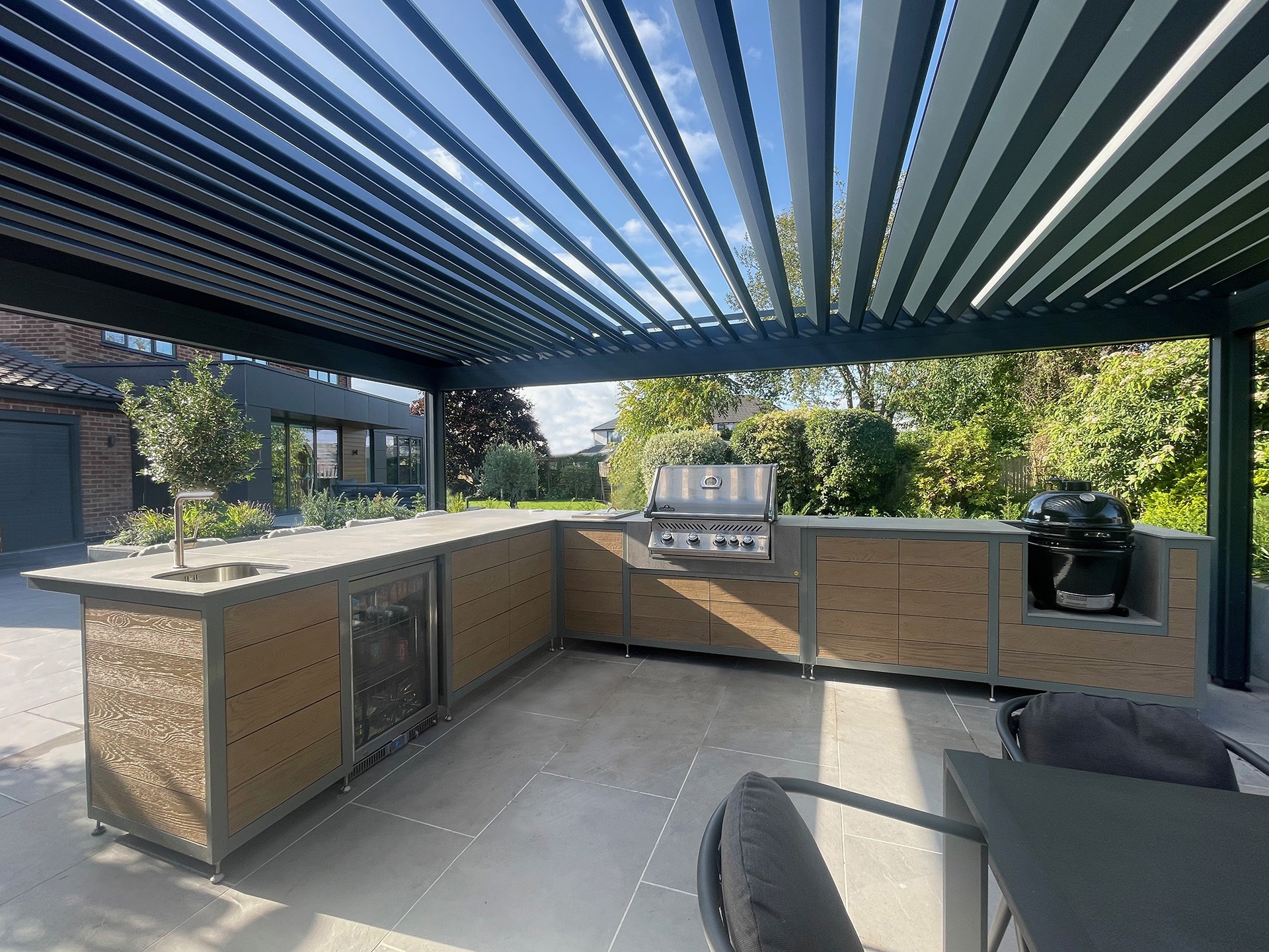 EQ Kitchens outdoor kitchen with BBQ and sink