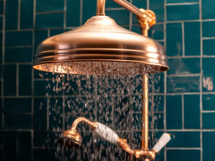 A shower head with a built in filter can reduce hard water