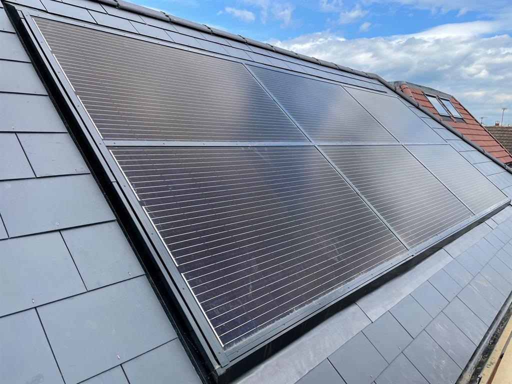 Six PV panels mounted in a roof-integrated solar installation by GB-Sol