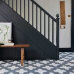 The stair decorating idea of painting the bannisters black will bring a dramatic update