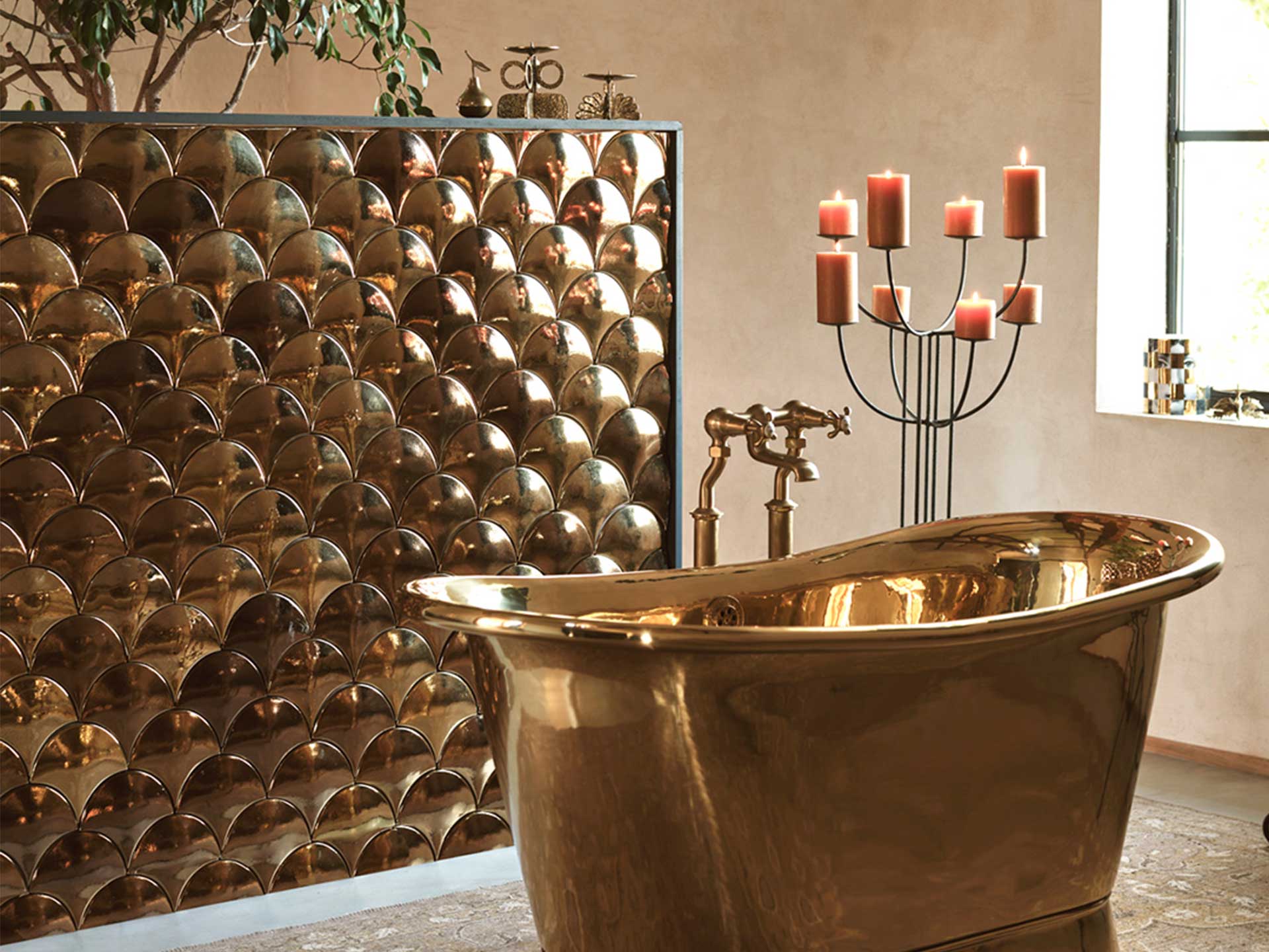 Try 3D ceramics like Otto Tiles & Design's bronze hand-crafted fish scales