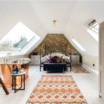 Use large picture windows to help with light and ventilation in your loft conversion