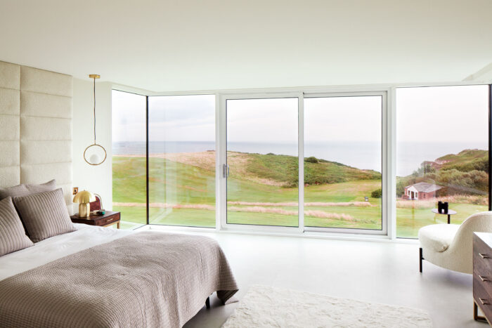 In Ferzana and Zahid’s bedroom on the first floor, the bespoke headboard was made by Hyder Living