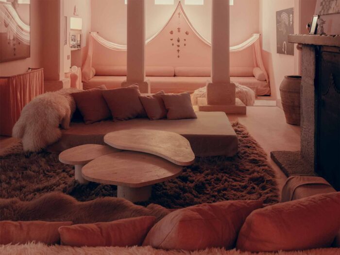 The warm pinks and soft curves create the most inviting vibe at Hotel Corazon
