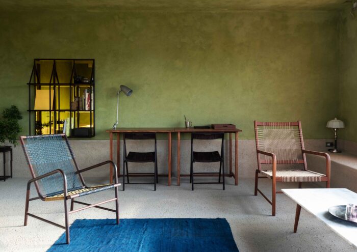 The green washed walls of Hotel Log's restaurant is a great hotel design idea to steal