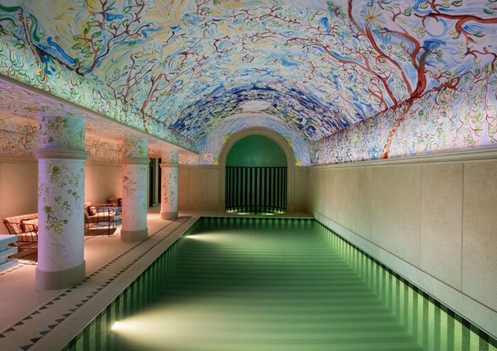 The spectacular swimming pool at Le Grand Mazarin with its illustrated ceiling