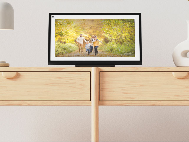 Close-up of console table displaying connected voice assistant hub from Amazon
