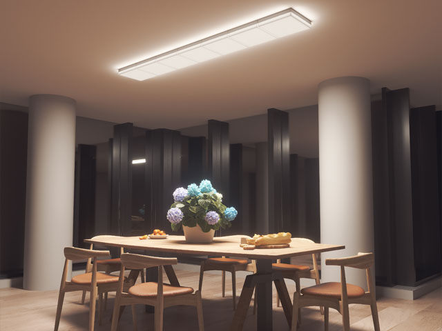 Dining area with artificial intelligence for the home in the form of a smart light fitting ceiling mounted above the dining table