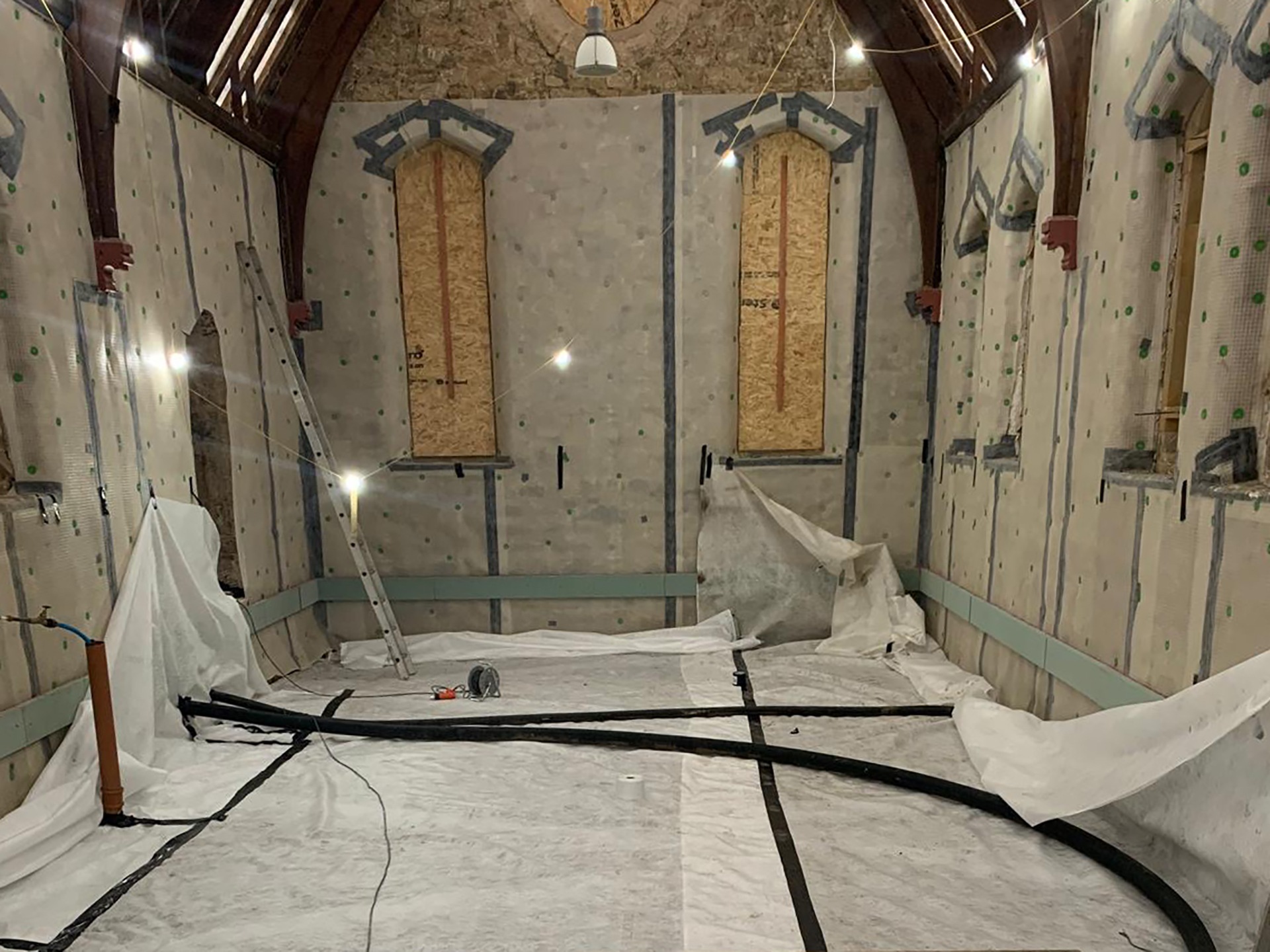 Installing the insulation at Warksburn Old Church