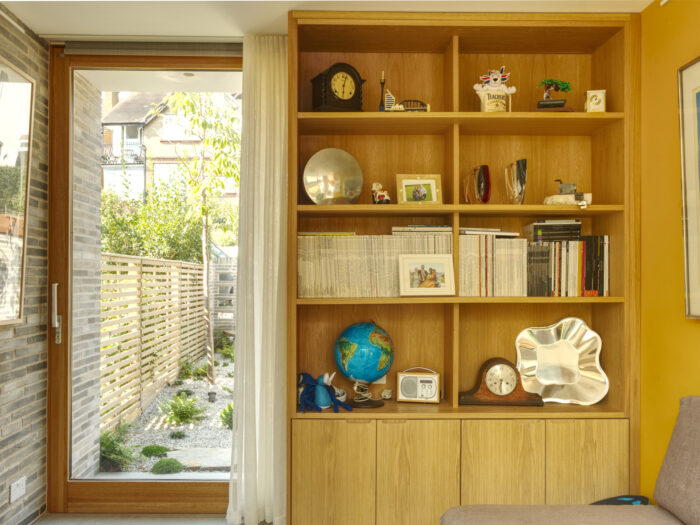 Detail of shelving from the sitting room at Sydenham self-build