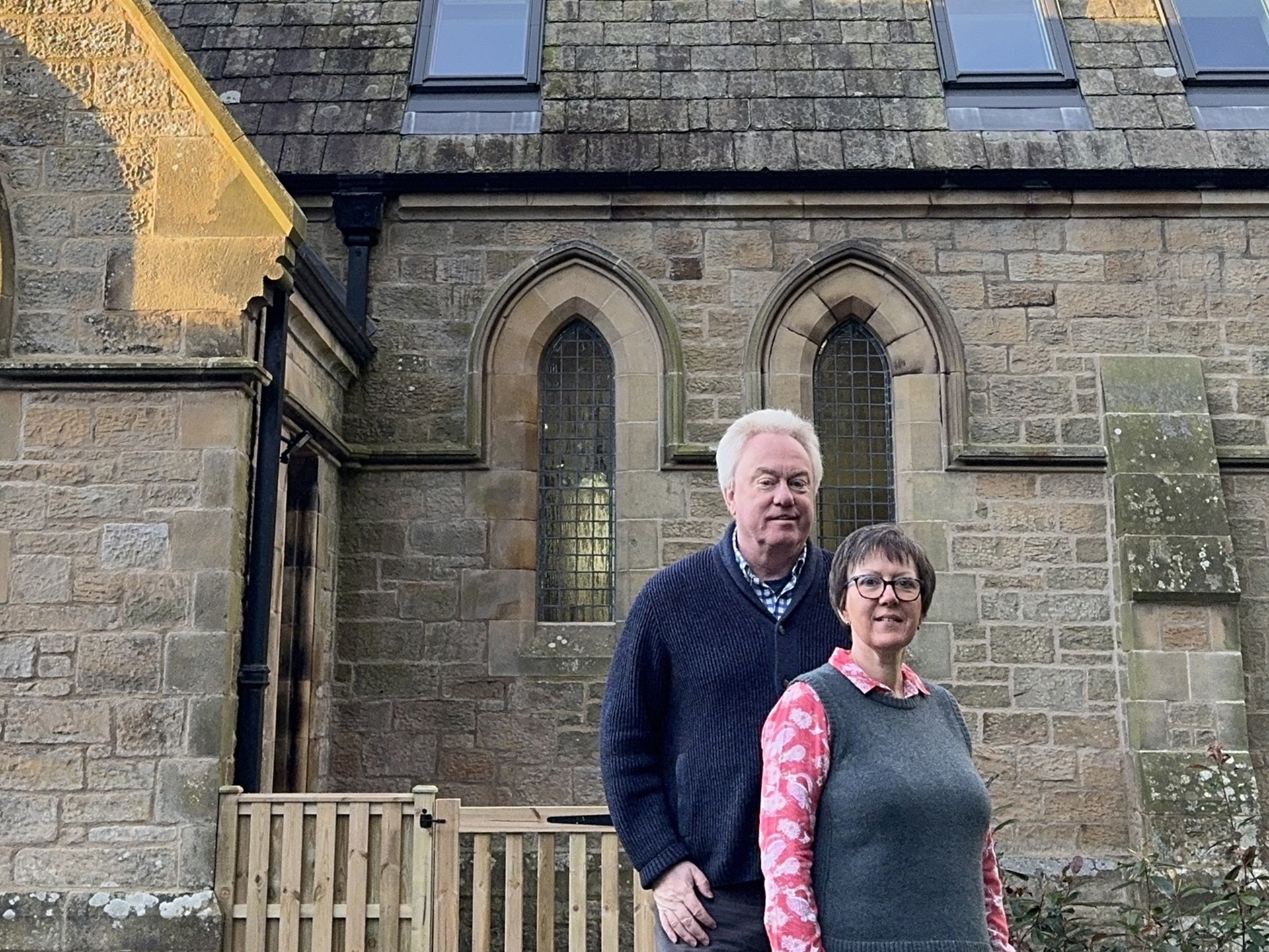 Alan and Anne James outside Warkburn Old Church