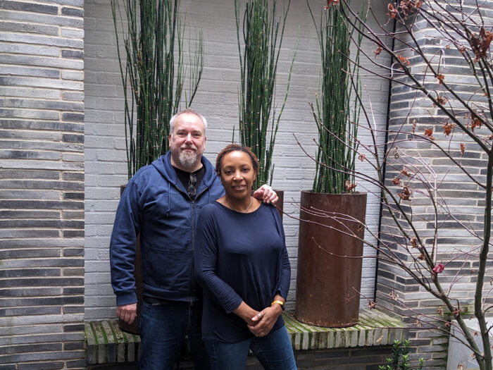 Andy and Jacquie Heath in the courtyard of their Sydenham self-build