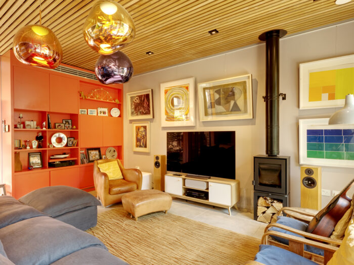 Sitting area in Sydenham self-build filled with art