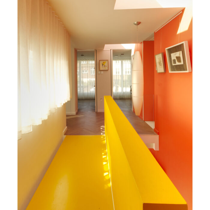 The yellow 'bridge' on the landing in the Sydenham self-build