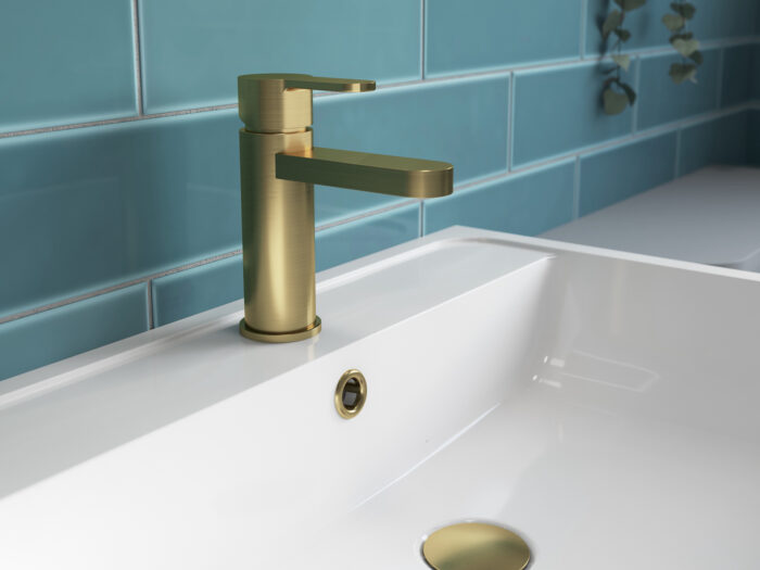 A contemporary brass tap on a sink