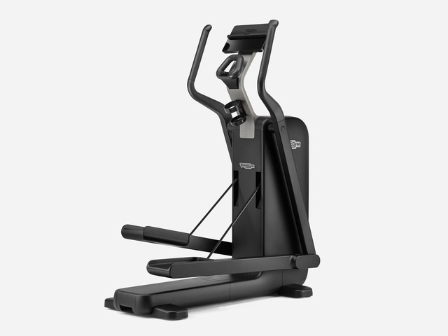 Technogym Elliptical cross trainer on white background