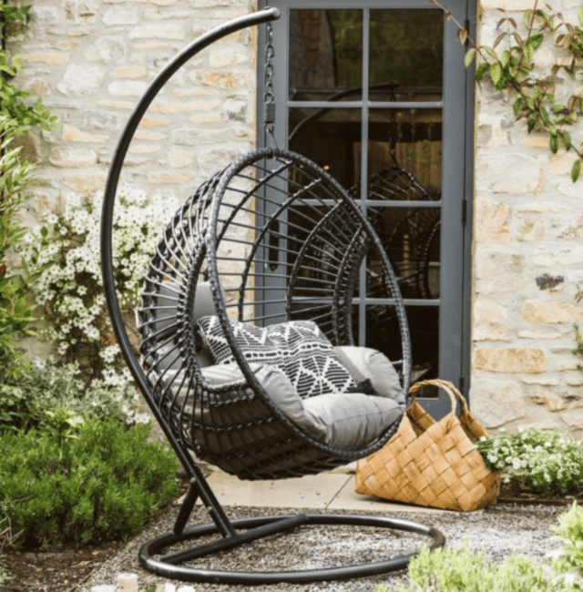 Curved egg chair in garden trend 2025
