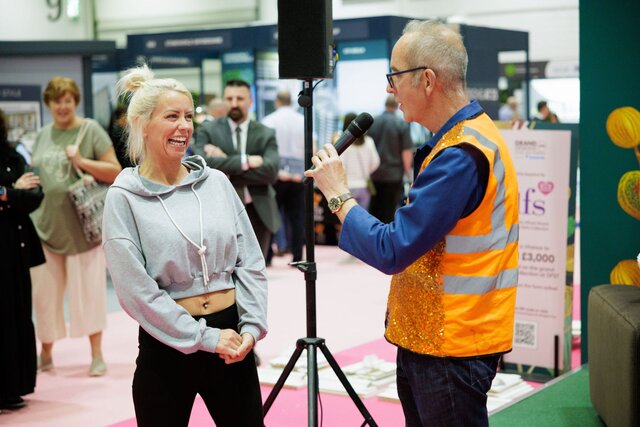 Winner receiving her prize from Kevin McCloud at Grand Designs Live