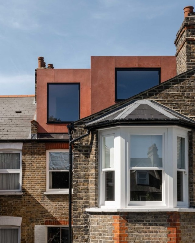 Shard view house with terracotta extension