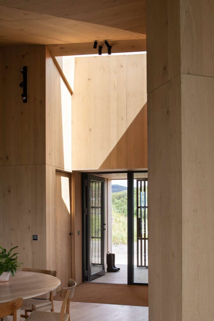 The front door leads into the dining area in the open plan area.
