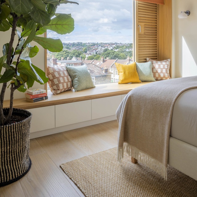 Bedroom window seat with storage underneath