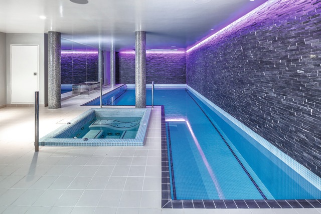 Swimming pool in luxury prefab home Surrey