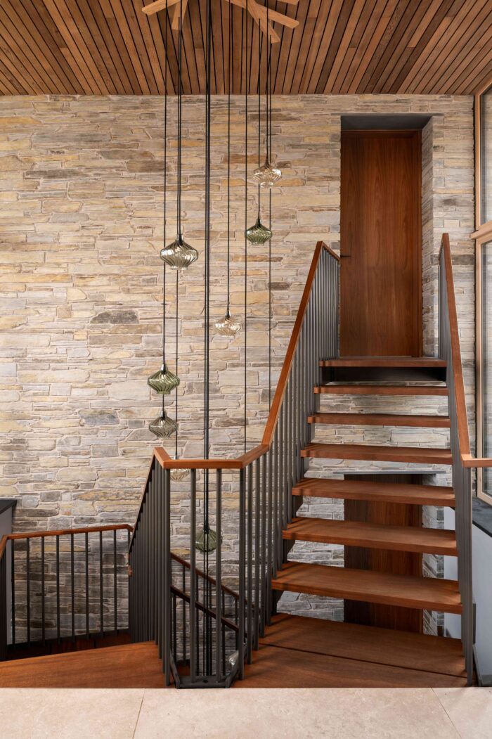 Open tread oak and steel staircase designed by KAST