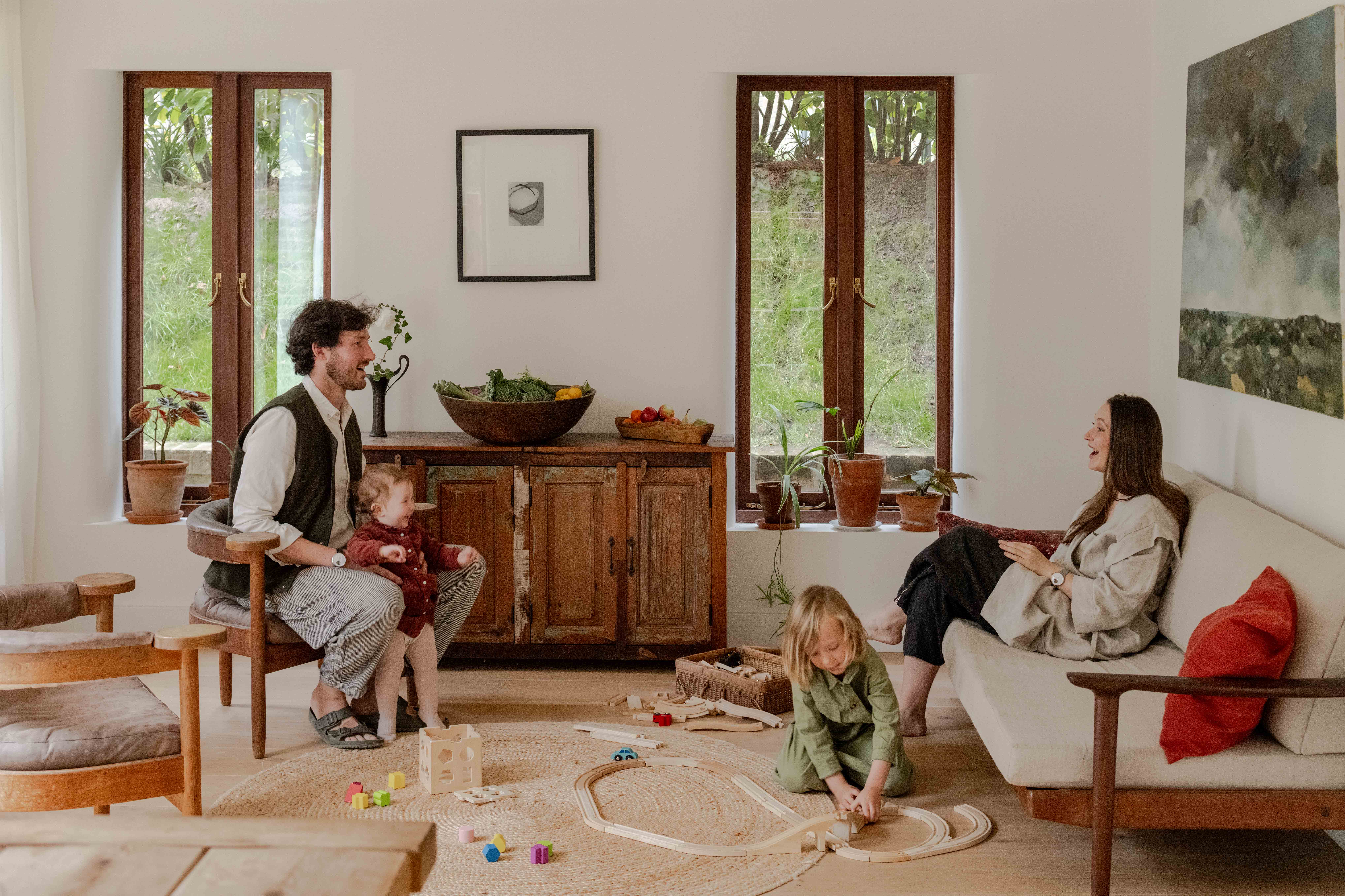 Parents and children in a living room
