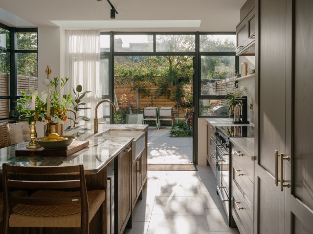Kitchen leading to stunning outdoor space 