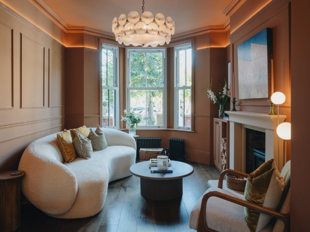 Cosy living space with bay windows in Tooting house