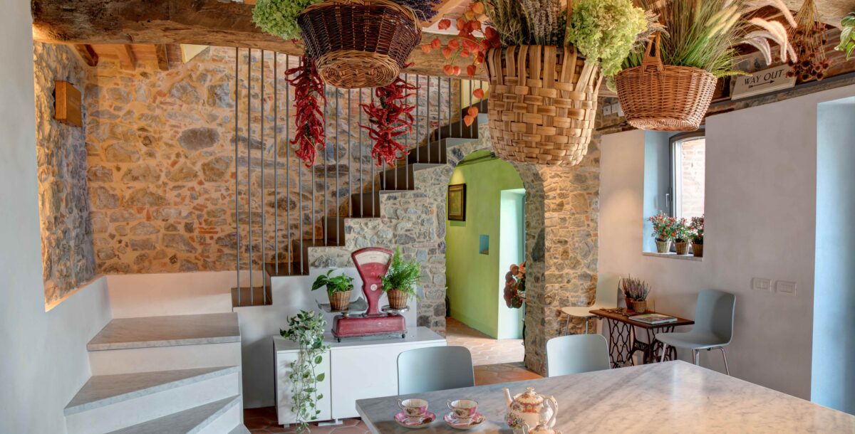 View of kitchen and bespoke staircase on basement level