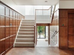 A new staircase improves the flow and light in the entrance. Photo: Leighton James