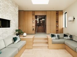 The new extension boasts a sunken living room with views of the large garden. Photo: Leighton James