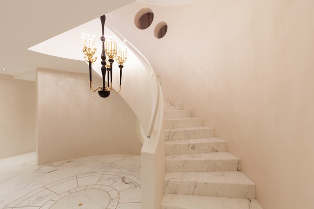 Moving a staircase marble grand staircase in luxury home