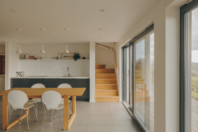 Open plan living, kitchen and dining area in Heb Homes build on the Sleat peninsula