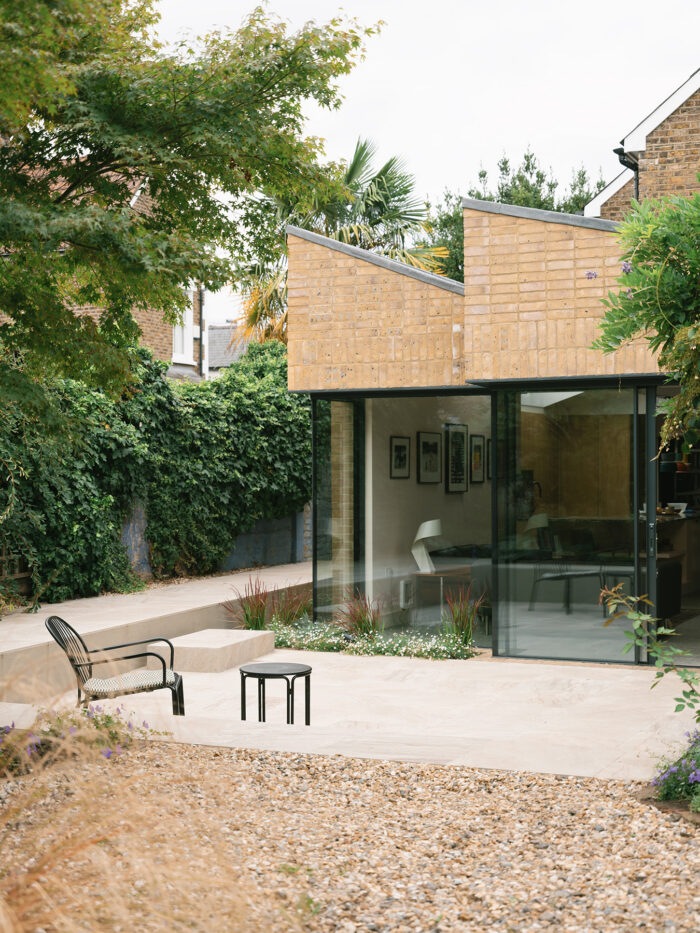 Sawtooth design roofline with brick cladding