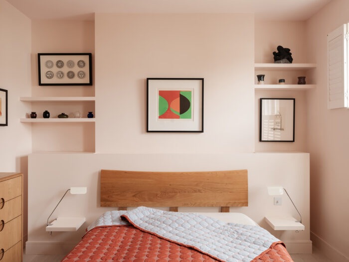 A pink modern style bedroom.
