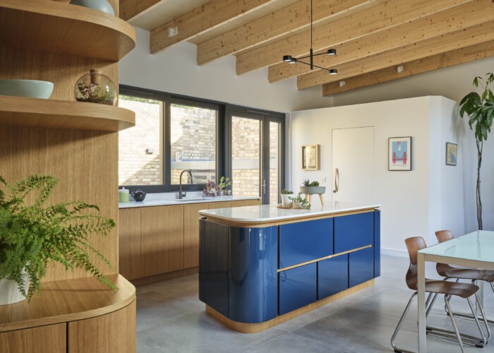 A timber and blue modernist-inspired kitchen
