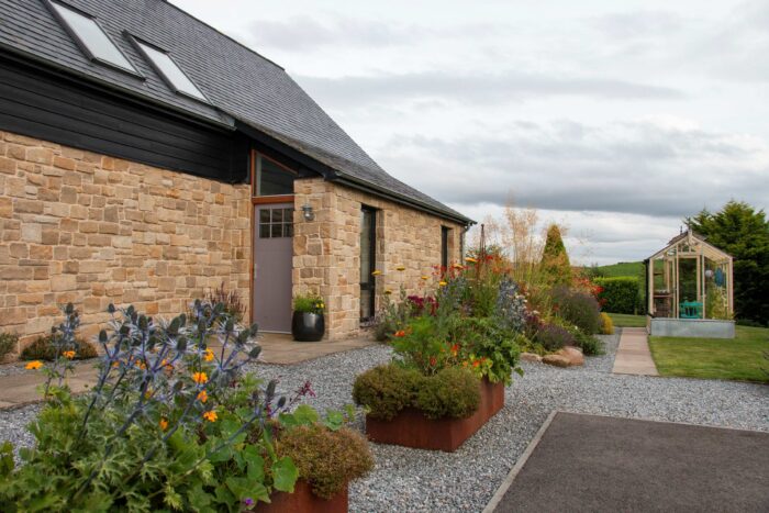 Cedral and sandstone exterior cladding Photo: Becky Saunderson