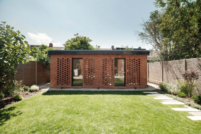 Garden office building with intricate brickwork